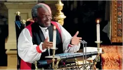  ?? OWEN HUMPHREYS/AP ?? The Most Rev Bishop Michael Curry, primate of the Episcopal Church, speaks during the wedding ceremony of Prince Harry and Meghan Markle at St George’s Chapel.