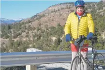  ?? GWEN ALBERS/FOR THE NEW MEXICAN ?? John Loehr, 80, at the High Point overlook in the Gallinas Canyon in Montezuma outside Las Vegas, N.M. Loehr does the 2.3-mile climb to the overlook every other day during his 8- to 12-mile rides.