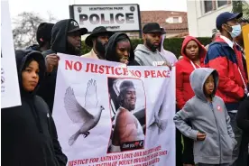  ?? Photograph: Patrick T Fallon/AFP/Getty Images ?? Family and friends of Anthony Lowe hold a news conference to demand an investigat­ion into his death.