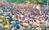  ?? PTI ?? Police personnel in a scuffle with members of Sarva Hindu Samaj during their protest in Udaipur on Thursday.