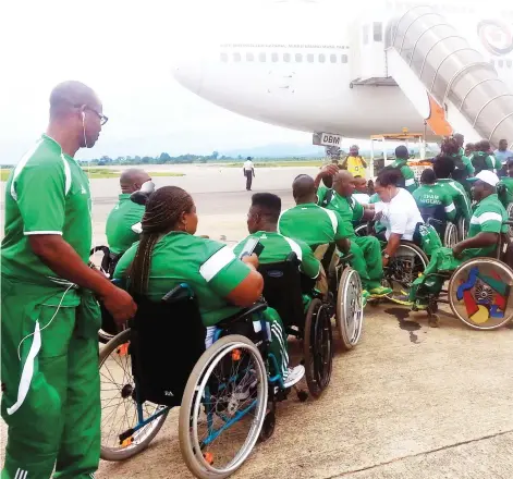  ?? PHOTO ?? Nigerian Athletes boarding at the Nnamdi Azikiwe Airport before their departure for the 11th All Africa Games, in Abuja yesterday.