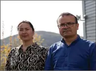  ?? (AP/Paul Johannesse­n) ?? Uyghur couple Mihrigul Musa (left) and Abduweli Ayup pose for a photo May 8 in their yard in Bergen, Norway.