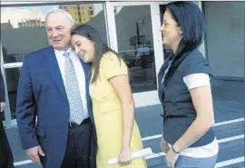  ?? Jeff Chiu
Associated Press ?? FORMER San Diego Mayor Jerry Sanders, shown with his daughter, Lisa, and her wife in 2010, said his daughter and her relationsh­ip helped change his mind.