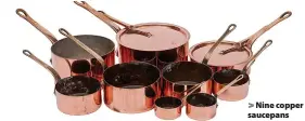  ??  ?? > Nine copper saucepans