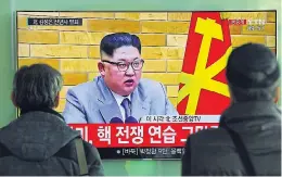  ??  ?? A broadcast in Seoul, South Korea, shows Kim’s speech yesterday