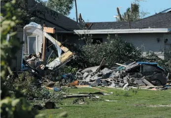  ?? CP PHOTO ?? Damage from a tornado is seen in Dunrobin, Ont., west of Ottawa on Monday.