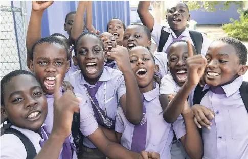  ?? FILE ?? Jubilant students of Ascot Primary School in St Catherine celebratin­g their GSAT results earlier this year.
