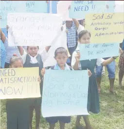  ?? (Photo courtesy of ?? ged children were photograph­ed with placards that of their parents while others lambasted the governs of their relatives and friends.
