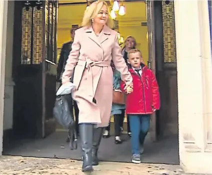  ??  ?? DAY IN COURT: Debbie Warner leaves the Supreme Court yesterday with Vincent who was given the go-ahead to sue