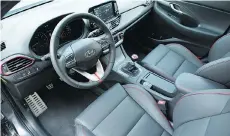  ??  ?? The interior of the 2017 Hyundai Elantra GT Sport has visual appeal.