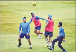  ?? PTI ?? Cricketers M S Dhoni, Shikhar Dhawan, Manish Pandey and Yuzvendra Chahal play a game of football during a practice session ahead of the third T20 against Australia, at Rajiv Gandhi Internatio­nal Cricket Stadium in Hyderabad on Thursday.