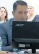  ?? COURTROOM POOL VIDEO ?? Former police officer Nouman Raja watches a video made during a walkthroug­h of the shooting with the Palm Beach Sheriff ’s Office as it is played Wednesday during his trial in West Palm Beach.