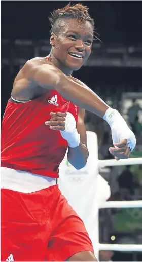  ??  ?? ■
A jubilant Nicola Adams on securing back-to-back Olympic golds.