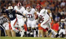  ?? BRYNN ANDERSON — THE ASSOCIATED PRESS FILE ?? Alabama quarterbac­k Jalen Hurts runs the ball during the second half of game against Auburn.