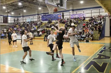  ?? BEN HASTY — MEDIANEWS GROUP ?? Students and teachers battle to raise awareness of suicide prevention during the Blazers BALL basketball game at Daniel Boone High School.