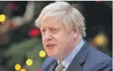  ?? DAN KITWOOD/GETTY IMAGES ?? Prime Minister Boris Johnson speaks on Downing Street on Friday.