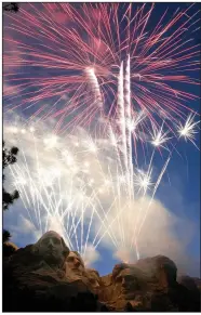  ?? (AP/Rapid City Journal/Seth A. McConnell) ?? Fireworks light up the night sky over the Mount Rushmore National Memorial on July 3, 2007. Thousands of people are expected to be on hand today when President Donald Trump speaks at the memorial in South Dakota.