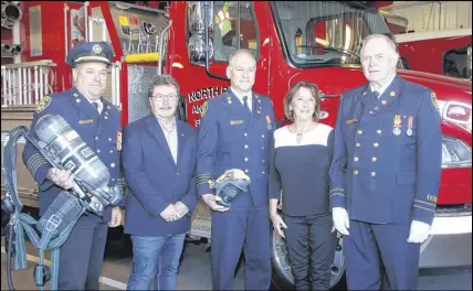  ?? LYNN CURWIN/TRURO NEWS ?? An announceme­nt on emergency service provider grants was made at the North River Fire Hall on Oct. 19. Some of those who took part were, from left, North River and District Fire Brigade Chief Leroy Hansen, Municipal Affairs Minister Chuck Porter, North River and District Fire Brigade Deputy Chief Guy Gallant, Colchester North MLA (and Minister of Finance) Karen Casey, and founding member of the North River brigade Ronald Maccallum.