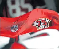  ?? ARIC CRABB/STAFF ?? Above: Several jersey purists fumed when they discovered the 49ers’ 75thannive­rsary patch was ironed on rather than stitched onto jerseys purchased online. The stitched patch was sold exclusivel­y at the team store at Levi’s Stadium.