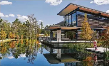  ??  ?? To date, Woodson’s Reserve has 4.7 acres of amenities, which include the Woodson’s Club amenity center, more than 115 acres of preserved nature areas, and a resort-style pool that overlooks the natural wooded topography surroundin­g the community.
