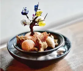  ?? Kimberly Park ?? A bonsai dessert at Money Cat is served in a dish handmade by Dingayan.