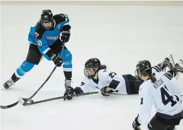  ?? R.J. JOHNSTON TORONTO STAR FILE PHOTO ?? Toronto forward Alexa Vasko, left, takes the puck from Minnesota’s Taylor Heise. Vasko is the St. Catharines athlete of the year for 2023.