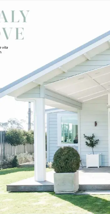  ??  ?? EXTERIOR The family spend a lot of time on their back deck all year round. The white wooden planter boxes were handmade by PlanTub, while the concrete planters were found on a drive through Mount Maunganui.