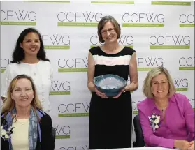  ?? SUBMITTED PHOTO ?? Pat Yoder, center, public health nurse and long-time community advocate, accepted the Kitchen Table Award at CCFWG’s 2020 Virtual Making a Difference Luncheon. She was joined by CCFWG Board Chair Judi Bell, seated left, Executive Director Michelle Legaspi Sanchez, standing left, and Board Member and Luncheon Master of Ceremonies Pattie Diggin, right.