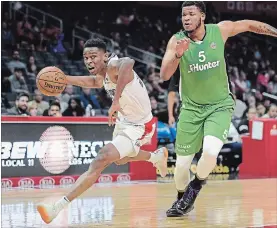  ?? ASSOCIATED PRESS FILE PHOTOS ?? Los Angeles Clippers guard and Hamilton native Shai Gilgeous-Alexander, left, has been voted the steal of the National Basketball Associatio­n draft after a strong pre-season.