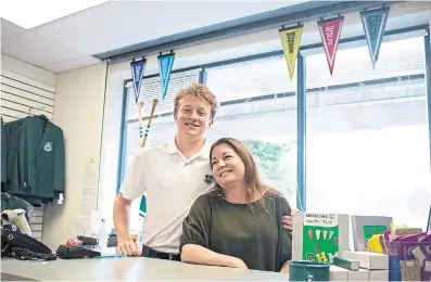  ?? LIZ BEDDALL FOR THE TORONTO STAR ?? Beth Currie Watt, president of Crescent School’s parent associatio­n and mother to Grade 11 student Greydon, at the school’s on-campus store The Den, which is staffed throughout the day by parent volunteers.