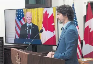  ?? ADRIAN WYLD THE CANADIAN PRESS ?? During a virtual call Tuesday, U.S. President Joe Biden enlisted Canada as a partner in about half a dozen of his administra­tion’s top priorities, which include climate change, the economy and China.