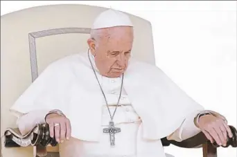  ?? Andrew Medichini/Associated Press ?? Pope Francis sits in a pensive mood during his weekly general audience at the Vatican on Wednesday.