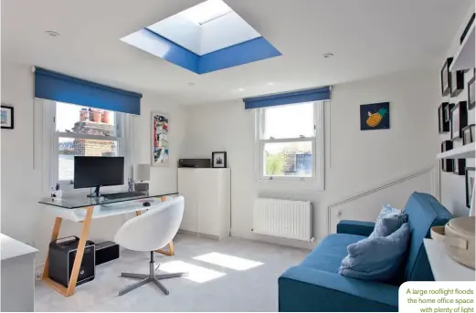  ??  ?? A large rooflight floods the home office space with plenty of light