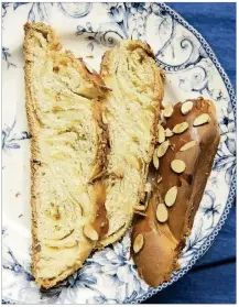  ?? CONTRIBUTE­D BY DEB LINDSEY ?? You can make challah with a number of fillings and toppings, but getting the braid right can be the hardest part of mastering this bread.