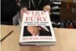  ?? OLIVIER DOULIERY/TNS FILE PHOTO ?? Fire and Fury is a hot ticket at bookstores — and libraries.