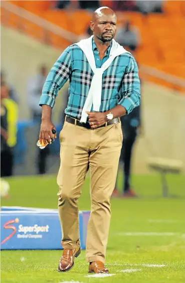  ?? Picture: Gallo Images ?? Smartly dressed Kaizer Chiefs coach Steve Komphela marked his 100 games with a 2-1 win over Polokwane City.
