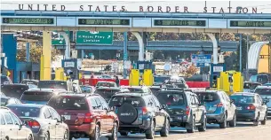  ?? MARCUS OLENIUK/TORONTO STAR FILE PHOTO ?? Under a pilot program that launched in 2017, Canadian border enforcemen­t officials restricted “flagpoling” to Tuesday through Thursday at land ports of entry in Southern Ontario and Quebec.