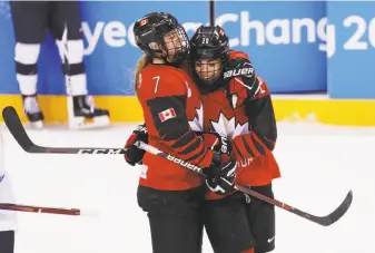  ?? Maddie Meyer / Getty Images ?? Canada’s Laura Stacey (left) and Sarah Nurse celebrate after Nurse scored in the second period against the United States. The two nations are the only countries to win gold in women’s hockey.