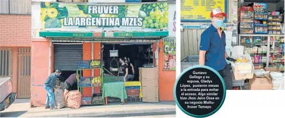  ?? Fotos | Freddy Arango | LAPATRIA ?? Gustavo Gallego Galleg y su esposa, Gladys López, pusieron mesas a la entrada para evi evitar el acceso. Algo similar hizo Jhon Jairo Ossa en su fruver negocio Tamayo. Multu Multufruve­r