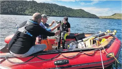  ?? PHOTO: SUPPLIED ?? Research . . . Scientists (from left) Riki Ellison, Marcus Vandergoes and John Pearman collect samples from Lake Okareka, near Rotorua.