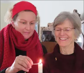  ?? CONTRIBUTE­D PHOTO ?? Shanda Lowery-sachs and Judy Lowery lighting a candle for Advent!