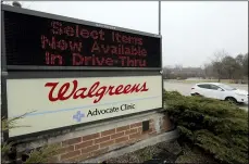  ?? NAM Y. HUH — THE ASSOCIATED PRESS FILE ?? A Walgreens sign is displayed outside the store in Wheeling, Ill., in 2020.