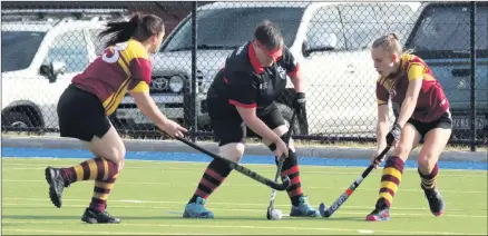  ?? Picture: SIMON KING ?? BACK IN ACTION: Horsham Jets’ defender Sue Puls, centre, looks to clear the ball despite pressure from Warrack players Jessamy Bennett, left, and Faith Eilola.