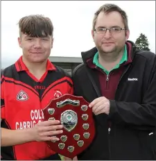  ??  ?? Jack Donohoe (captain) with Dean Goodison of People Newspapers.