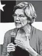  ?? CHARLES KRUPA/AP ?? Elizabeth Warren called for remaking immigratio­n enforcemen­t agencies.