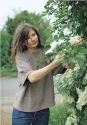  ??  ?? Left Buckwheat, cherry and pea-shoot salad. Above Anja Dunk, picking elderflowe­rs