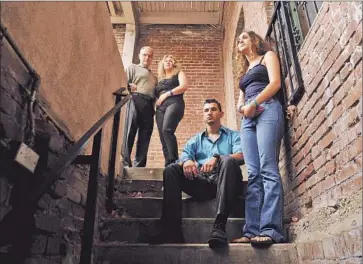  ?? Christina House For The Times ?? OUTSIDE THEIR LAWYER’S Pasadena office, from left, are father Amr Morad, mother Amal Alkabra, cousin Kareem Morad and sister Ghada Morad. Feras Morad, 20, was shot during a struggle with an officer.