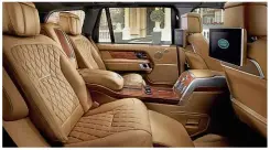  ??  ?? LOUNGE ACT Plush executive rear seats are complement­ed by a top-end infotainme­nt system and fridge
