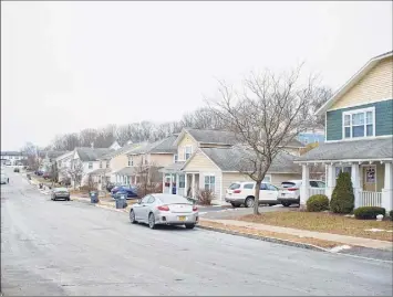  ?? Paul Buckowski / Times Union ?? A view of the North Albany Homes in Albany on Monday. Plans to renovate the units include installing new roofs and remodeling kitchens and bathrooms