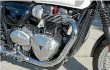  ??  ?? You can tell the 900cc twin from the 1200cc by the lack of faux carburetto­rs on intake tracts.